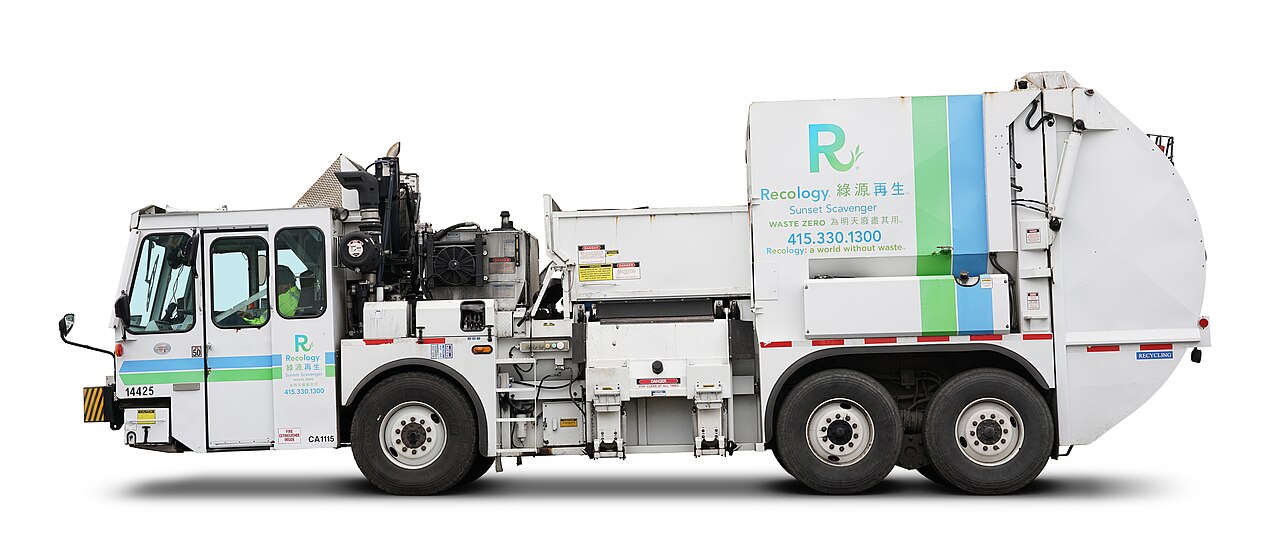 A residential garbage collection truck